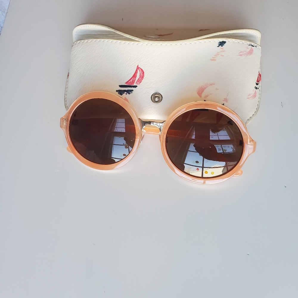Pink sunglasses with matching case